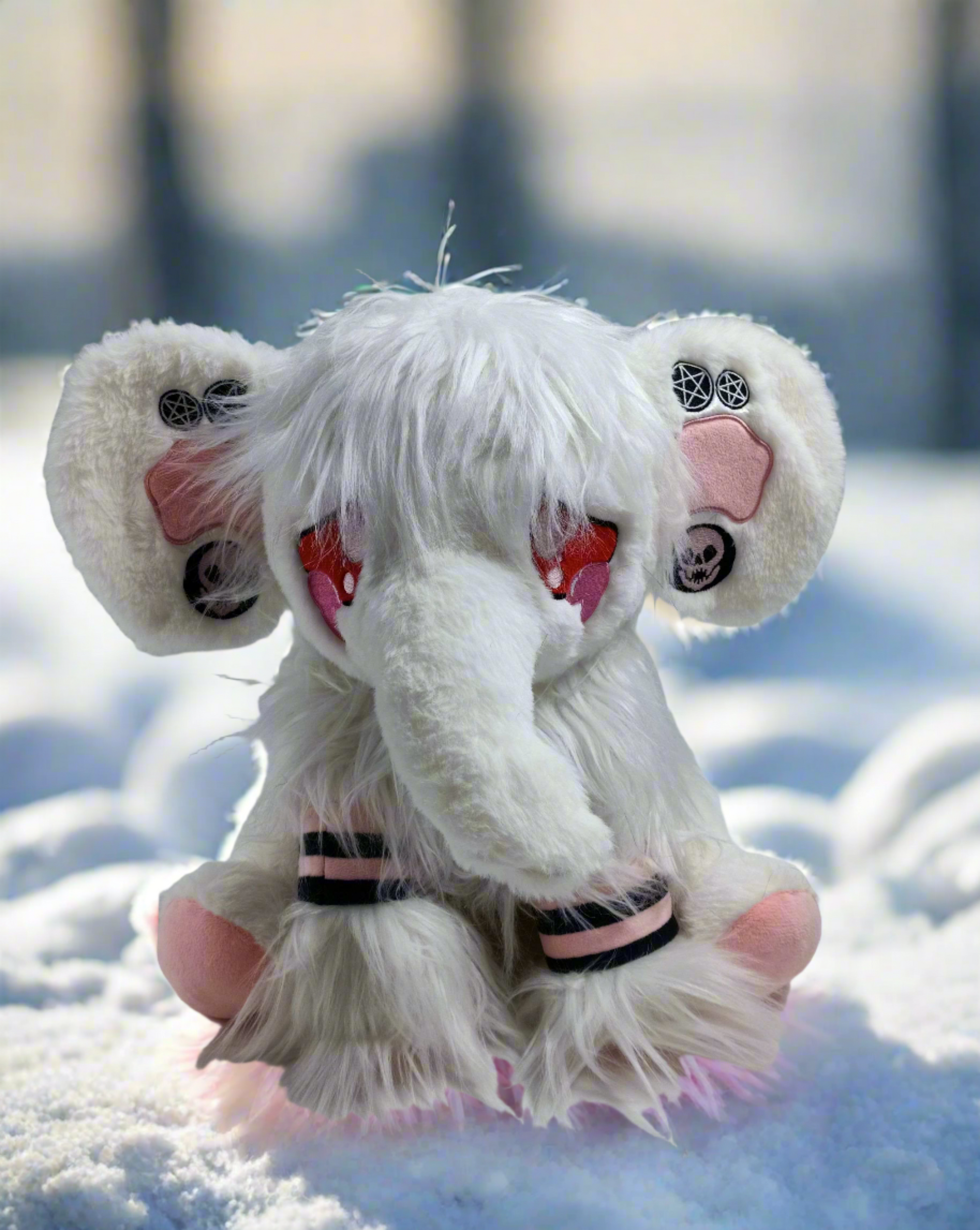 Albino Goth emo wooly mammoth sitting on a snow drift